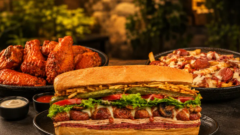 Haida Royal sandwich with wings and loaded fries